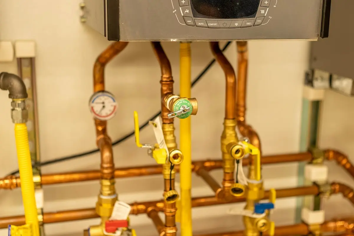 Licensed technician providing Water Heater Installation for a homeowner in Fenton